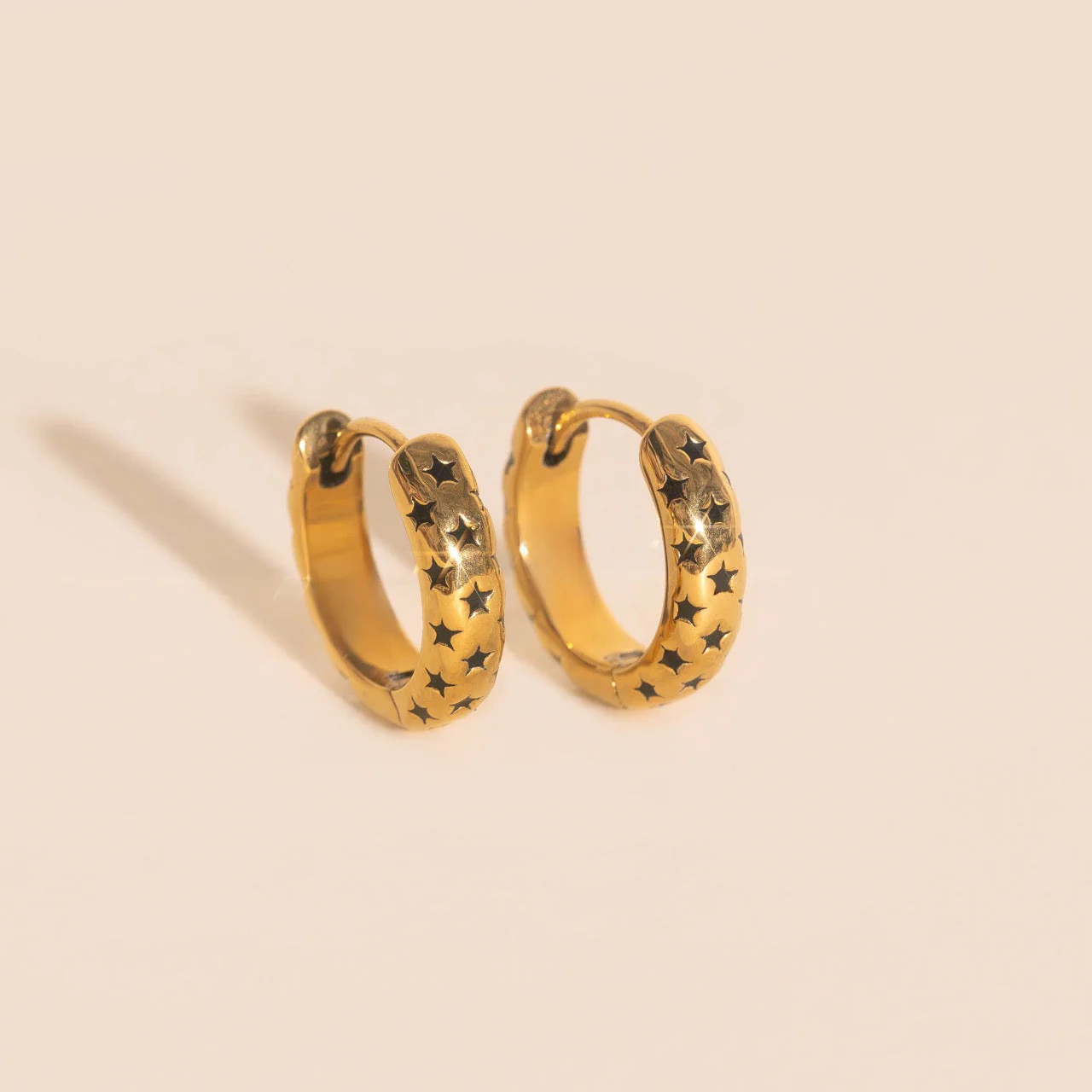 Black Star Chunky Huggie Hoop Earrings - Image 3
