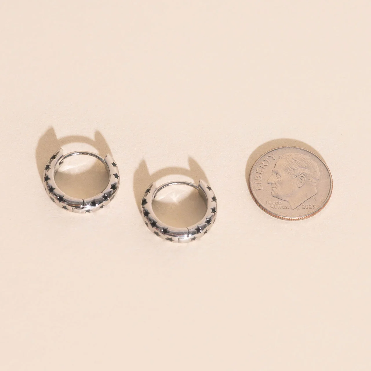 Black Star Chunky Huggie Hoop Earrings - Image 7