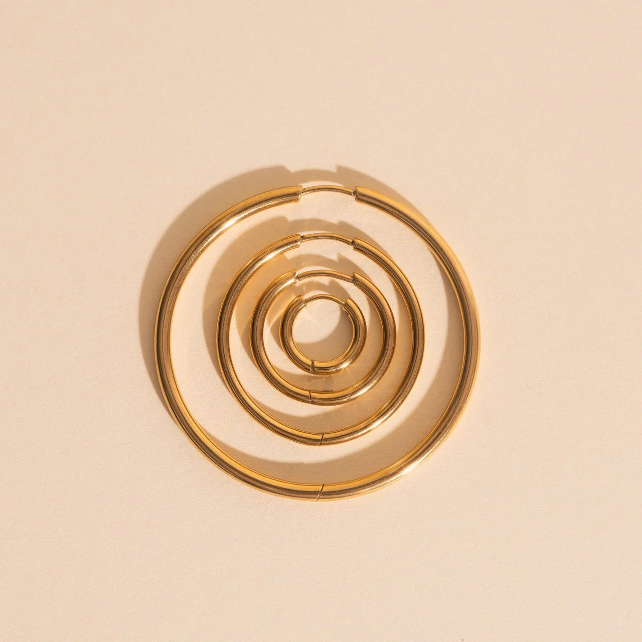 Circle Rounded Huggie Hoop Earrings - Image 2