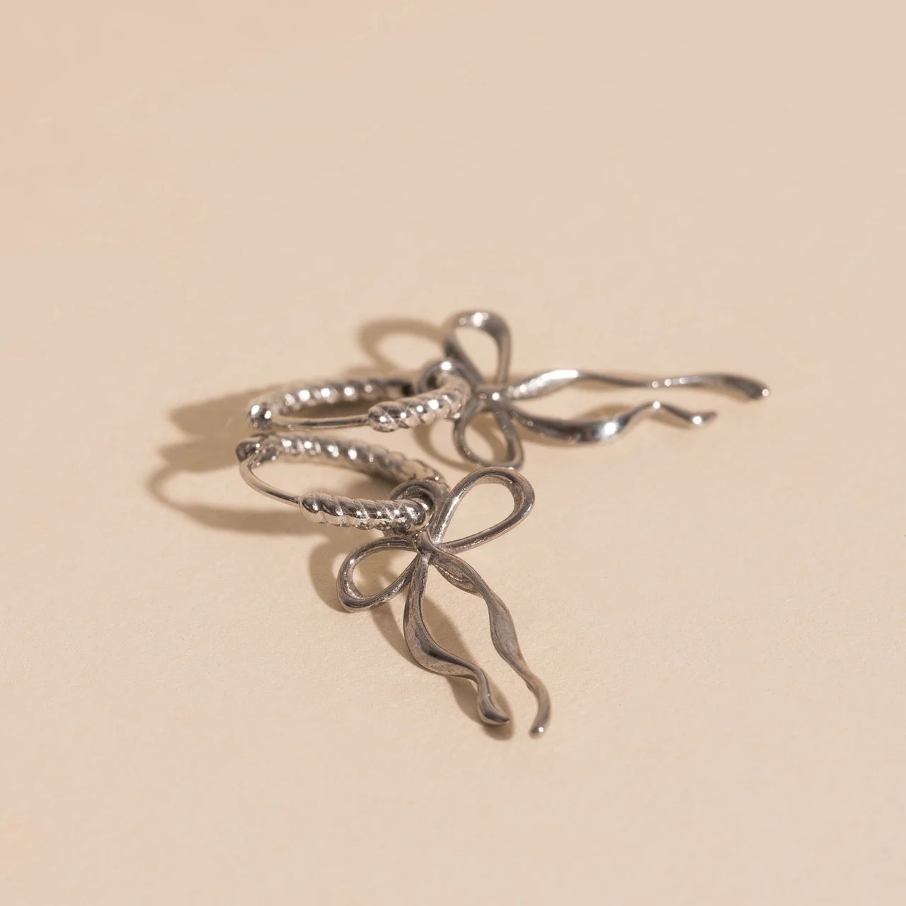 Dainty Bow Huggie Hoop Charms - Image 3