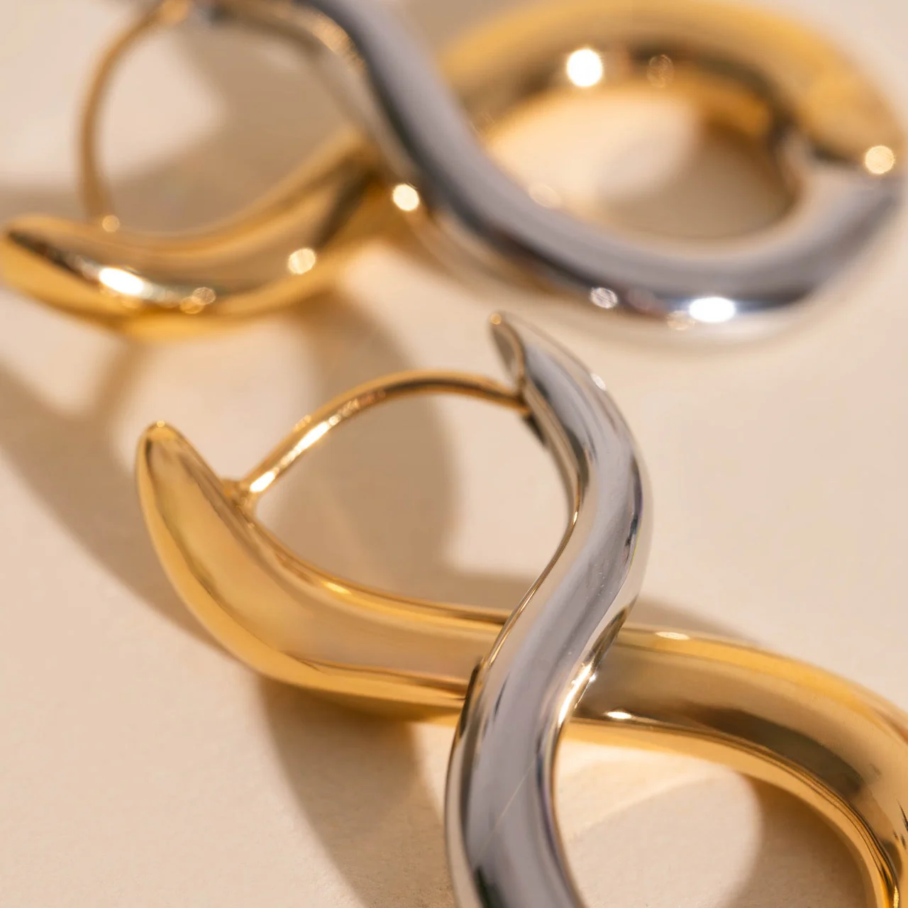 Infinity Chunky Rounded Huggie Hoop - Image 4