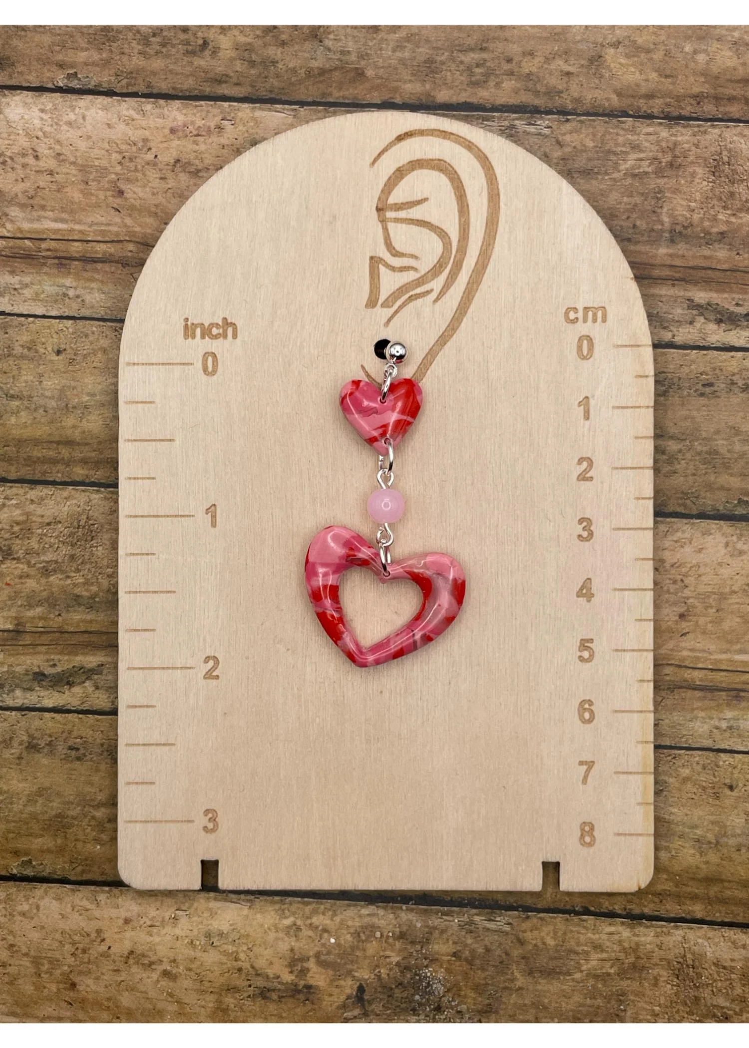 Double Heart Swirl Earrings with Pink Gemstone - Image 2
