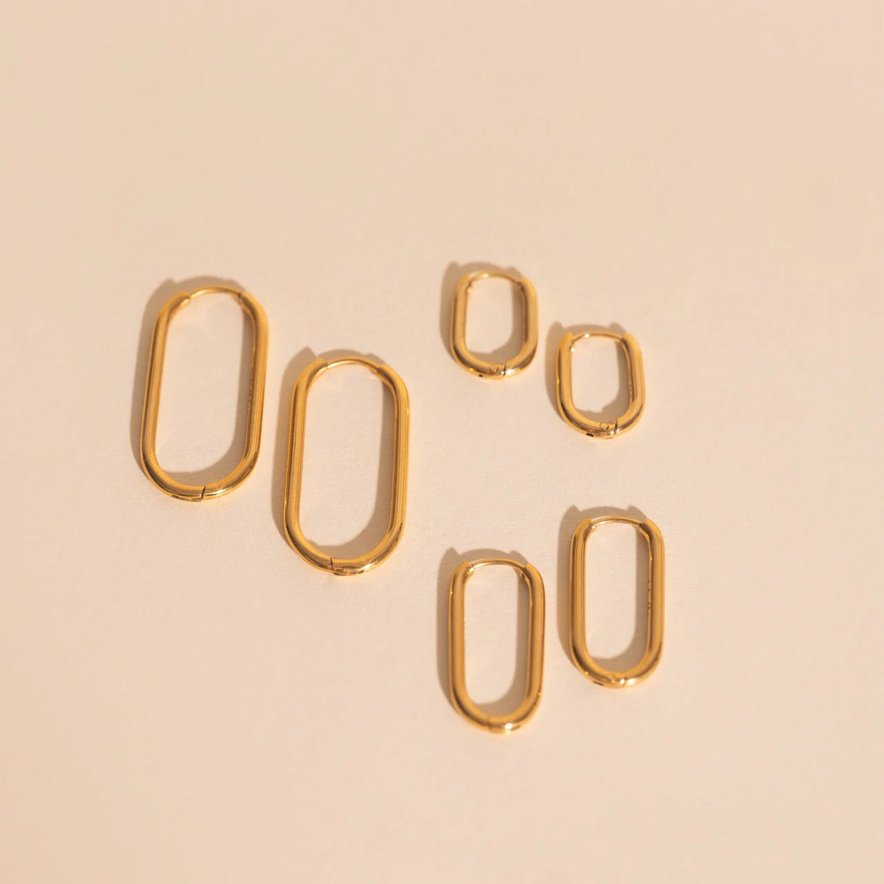 Rectangle Rounded Huggie Hoop Earrings - Image 17