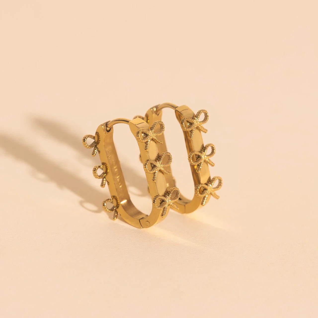 Stacked Rope Bow Oblong 3D Huggie Hoop Earrings - Image 2