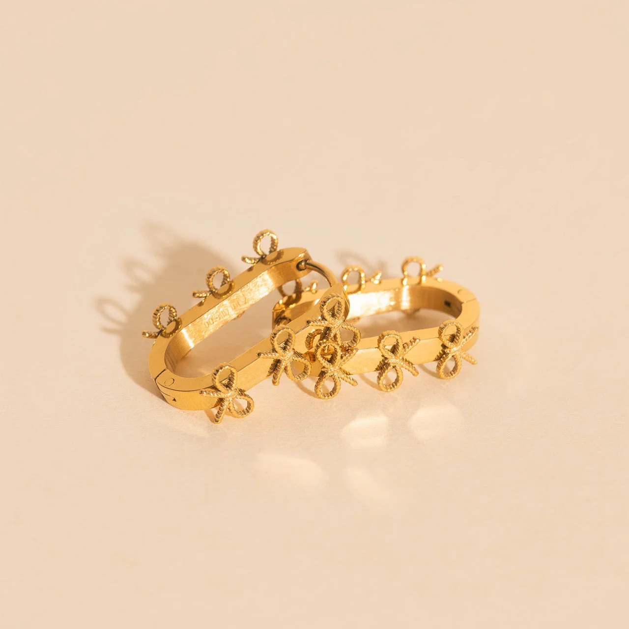 Stacked Rope Bow Oblong 3D Huggie Hoop Earrings - Image 3