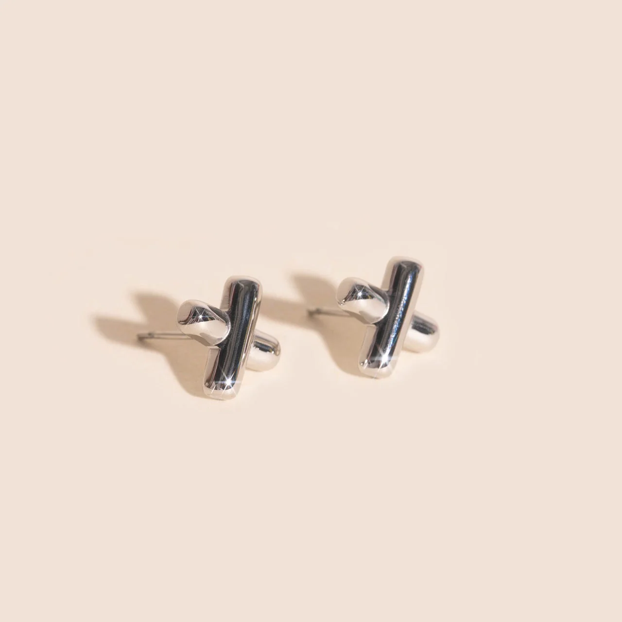 X Stud Earrings - Image 6